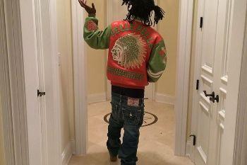 887e56 chief keef pelle pelle renegades fire orange plush leather jacket native american chief indian head true religion jeans timberland boots on feet